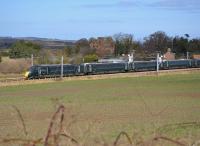 GWR-liveried 800004 passes Redhouse Castle, a little east of Longniddry, with a Doncaster - Edinburgh training run.  Seen from the Haddington branch embankment.<br><br>[Bill Roberton 19/03/2018]