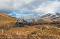 I could hear this working hard climbing Glen Falloch long before I could see it. 44871 and 45407 (with 37517 at the rear) have just cleared the Crianlarich Viaducts and are turning west to run along Strath Fillan. A snowy Ben More provides the backdrop.<br><br>[Ewan Crawford 28/03/2018]