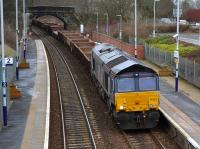 DRS 66303 leads a Ladybank - Millerhill engineers train through Dalgety Bay on 18 March.<br><br>[Bill Roberton 18/03/2018]