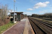 At one time Maryport had a huge stone built station building, but only ever a single platform. Nowadays this shelter suffices at the unstaffed station, seen here on 9th March 2018 looking towards Carlisle.<br><br>[Mark Bartlett 22/03/2018]