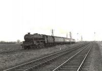 A Dumfries - Glasgow St Enoch local photographed shortly after leaving Mauchline in the spring of 1959. The locomotive is Black 5 4-6-0 no 45081. [Ref query 11 April 2018]<br><br>[G H Robin collection by courtesy of the Mitchell Library, Glasgow 30/03/1959]