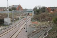 A maintenance team was just adjusting the final few connectors at Poulton on 12th April 2018 but the line from Preston to Blackpool North is completely wired now and ready for reopening (initially to diesel trains) on the 16th. Electric services will start with the May 2018 timetable. [See image 19029] for the view from this overbridge ten years earlier. <br><br>[Mark Bartlett 12/04/2018]
