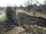 The southern approach to Jedfoot station in February 2018, looking south towards Jedburgh from alongside the A698. At this point the trackbed runs parallel with the Jed Water just off to the right. The remains of Jedfoot station lie behind the camera on the north side of the road [see image 63005]. <br><br>[John Furnevel 24/02/2018]