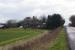 French Drove station on the former Great Northern and Great Eastern Joint line between March and Spalding on 20 February 2018. The original brick station building has been supplemented with several single storey wooden structures. On the right the road crossed the railway at a level crossing; the signalbox that controlled it has also found a new use.<br><br>[John McIntyre 20/02/2018]