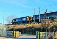 DRS 37424 <I>Avro Vulcan XH558</I> seen approaching the viaduct over the River Wyre at Scorton at the head of 2C47 1003hrs Preston to Barrow-in-Furness on a crisp 9th February 2018.<br><br>[Mark Bartlett 09/02/2018]