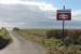 The access to remote Nethertown station could easily be missed but for this large double arrow sign at the junction of the long approach lane, which is unsurfaced and steep at the far end. To the left of the sign another railway location, the Isle of Man, can just be made out. <br><br>[Mark Bartlett 08/03/2018]