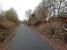 The latest stretch of the Rosslyn Chapel Trail (Glencorse branch, to you and me) takes it through Gilmerton station. Nothing to see at platform level, but the station house is visible through the trees in this view, looking south west. The station was rather isolated when it closed in 1930, but the village had grown southwards since, with the latest housing being built across the road. If only they could have foreseen this 88 years ago ...<br><br>[David Panton 12/03/2018]