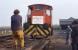 English Electric D908 of 1964, donated by British Alcan, Falkirk, being delivered to Prestongrange Museum in the 1980s, though John Kirk seems to be pulling it back on to the low-loader!<br><br>[Bill Roberton //]