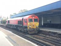 The 0915 Trafford Park Euro Terminal to Southampton Western Docks nears the end of it's journey on 16th March.  66 185 drags it's load through Southampton Central platform 4.<br><br>[Caleb Abbott 16/03/2018]