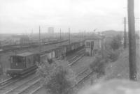 Looking south to Hamilton as Black V passes with goods. NB line to Hamilton tunnelled under this yard.<br><br>[John Robin 02/07/1963]