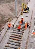 Continuing progress on the line to Larkhall in March 2005, with track laying now taking place near the site of the new Merryton station. Looking north west towards Hamilton.<br><br>[Ewan Crawford /03/2005]