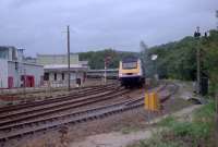 125 approaches Lostwithiel level crossing at speed.<br><br>[Ewan Crawford //]