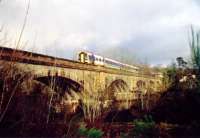 Southbound over the skew-arch viaduct at Conon Bridge.<br><br>[Ewan Crawford //]