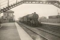 Duns station. Giving up tablet on entering.<br><br>[G H Robin collection by courtesy of the Mitchell Library, Glasgow 07/04/1950]