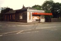 Alexandra Parade station building. Not helped by years of grime, white paint and orange canopy.<br><br>[Ewan Crawford //1987]