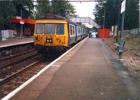 Westbound 311094 at Scotstounhill.<br><br>[Ewan Crawford //1987]