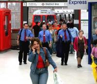 <I>'Hello.. control?....I think I've got a tail... blue shirts...red ties...mean looking gits...3 of them... could be Oyster agents....' </I>  Wimbledon District Line arrivals, July 2004.<br><br>[John Furnevel 03/07/2004]