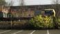 Leaf removal train passing the former Partickhill goods yard.<br><br>[Ewan Crawford //]