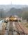 Looking west at the Edinburgh skyline as trains diverted over the sub meet on the bridge across Duddingston Park South road on Sunday 2 April 2006. Niddrie West Junction is in the foreground.<br><br>[John Furnevel 02/04/2006]