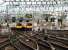 Local trains at Glasgow Central and railfan on right.<br><br>[Ewan Crawford //]