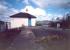 Balloch Pier looking north towards Loch Lomond in 1987. The site is completely cleared today. Disused bay platform to the left, electrified track to the right.<br><br>[Ewan Crawford //1987]