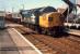 A tour train pulled by a 37 passes east through Cardross.<br><br>[Ewan Crawford //1987]