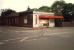 Alexandra Parade station building. Not helped by years of grime, white paint and orange canopy.<br><br>[Ewan Crawford //1987]