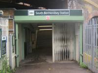 <h4><a href='/locations/S/South_Bermondsey'>South Bermondsey</a></h4><p><small><a href='/companies/S/South_London_Railway:_London_Bridge_Approach_London,_Brighton_and_Souh_Coast_Railway'>South London Railway: London Bridge Approach (London, Brighton and Souh Coast Railway)</a></small></p><p>The rather unwelcoming - especially at night - entrance to the 1928 station at South Bermondsey in south-east London, opened by the Southern Railway to replace the original 1866 station, slightly to the north-west, seen here on 15th June 2013. The 1866 station was known as Rotherhithe until 1869 when Rotherhithe got a more conveniently-located station on the East London Line, now part of London Overground. This used Sir Marc Brunel's historic Thames Tunnel that had opened in 1843 as a pedestrian footway, having taken 18 years to complete and was the world's first under water tunnel. 23/189</p><p>15/06/2013<br><small><a href='/contributors/David_Bosher'>David Bosher</a></small></p>