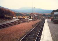 Crianlarich, east side of the station showing the engine shed. Since this photograph was taken a nice new station building in a more WHR chalet style has been built to replace the building on the right.<br><br>[Ewan Crawford //1987]