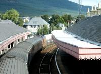 <h4><a href='/locations/A/Aviemore'>Aviemore</a></h4><p><small><a href='/companies/I/Inverness_and_Perth_Junction_Railway'>Inverness and Perth Junction Railway</a></small></p><p><i>Where am I?...  What day is this?...  Who are all these people?  </i><BR> A confused passenger peers out of the window of the late running Euston - Inverness sleeper (1130 as opposed to 0741) at Aviemore station on 24 September 2004. 9/42</p><p>24/09/2004<br><small><a href='/contributors/John_Furnevel'>John Furnevel</a></small></p>