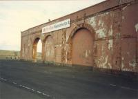 The Ardrossan welcome, Welcome to Ar. Following the closure of Winton Pier station and cut back to the new Ardrossan Harbour station this site greeted passengers from the ferry.<br><br>[Ewan Crawford //1987]