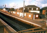 Newton-on-Ayr looking north. Unattractive and out of use building on southbound platform.<br><br>[Ewan Crawford //1987]