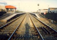 Looking east at Stevenston from the level crossing.<br><br>[Ewan Crawford //1987]