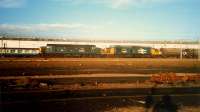 Westbound Ravenscraig-Hunterston coal empties passing Polmadie hauled by two 37s from the Motherwell steel pool. Access by kind permission of British Rail.<br><br>[Ewan Crawford //1987]