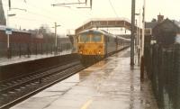 Heading north in the rain. The Dumfries platforms were to the right.<br><br>[Ewan Crawford //1988]
