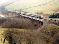 Southbound train crosses the Harthope Viaduct.<br><br>[Ewan Crawford //1988]