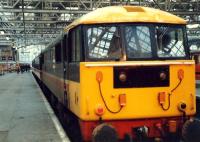 The old order of long distance electric train in Glasgow Central.<br><br>[Ewan Crawford //1988]