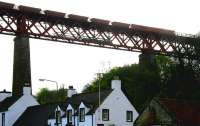 Diners at the Hawes Inn are forced to raise their voices a little as a coal train rumbles south over the rooftops of South Queensferry on a summer evening in 2006.<br><br>[John Furnevel 22/06/2006]