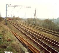 Finneston West Junction looking east. Eastbound train running down to Exhibition Centre. The westbound trains from Exhibition Centre take a different route via Finnieston East Junction.<br><br>[Ewan Crawford //1988]