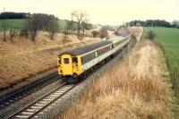 A 477 rounds the curve as it leaves Shotts heading west on an E&G diversion.<br><br>[Ewan Crawford //1988]