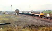 A Glasgow-Inverness train passes Cadder box.<br><br>[Ewan Crawford //1990]