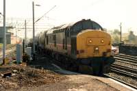 37 406 enters Dumbarton Central with a Mossend-Fort William freight.<br><br>[Ewan Crawford //1990]
