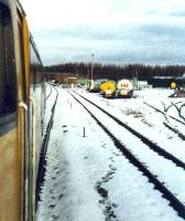 Culloden Bitumen depot and old station viewed from a northbound train. The butument sidings have been lifted.<br><br>[Ewan Crawford //1989]