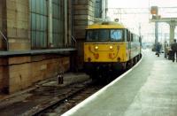 Empty stock being brought into platform 1 at Central. However as the WCML was closed this was to leave, 47 hauled, via Paisley and Ayr for the south.<br><br>[Ewan Crawford 26/11/1988]