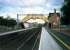 Uddingston looking east towards the junction. Express trains do not stop here, thus the yellow lines to stand behind as they pass through.<br><br>[Ewan Crawford //1987]