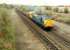 A 37 pulls a permanent way train south past the former Plean station.<br><br>[Ewan Crawford //1988]