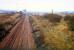 Carmyle looking west. From left to right; Norit works (still there), route to Rutherglen, demolished Clyde Iron (and distant Clydebridge Steelworks), route to Glasgow Central Low Level.<br><br>[Ewan Crawford //1988]