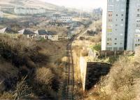 Looking west from the G&SW Cartburn Tunnels at Cartsburn Junction. The line to the left was the mainline via Kilmacolm and the line to the right was the branch to Inchgreen, later utilised to access the containerbase from the Wemyss Bay line.<br><br>[Ewan Crawford //1988]