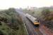 Eastbound DMU passing Woodilee.<br><br>[Ewan Crawford //1990]