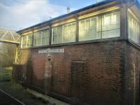 <h4><a href='/locations/S/Sutton_Bridge_Junction'>Sutton Bridge Junction</a></h4><p><small><a href='/companies/S/Shrewsbury_and_Hereford_Railway'>Shrewsbury and Hereford Railway</a></small></p><p>Sutton Bridge Junction signal box, south of Shrewsbury, seen from The Railway Touring Company's return excursion from Hereford to Stevenage,  on the afternoon of Saturday, 26th February 2022. This is where the Severn Valley Railway diverged until closed in 1963 although, of course, the section south from Bridgnorth has been revived as one of the UK's premier heritage lines.  Sadly, the northern section through the popular Ironbridge Gorge remains closed and Ironbridge & Broseley station site is now a car and coach site, another savage act of legalised vandalism. 20/23</p><p>26/02/2022<br><small><a href='/contributors/David_Bosher'>David Bosher</a></small></p>